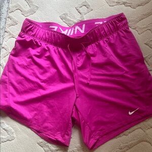 Nike Women's Fuchsia Athletic Shorts
